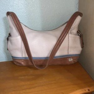 The sck in a beautiful, two toned hobo style leather bag(0300)